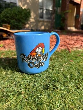 RAINFOREST CAFE Blue Mug with Parrot Graphic